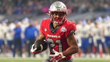 UNLV Rebels wide receiver Jacob De Jesus (21) runs against the Kansas Jayhawks during the first half at Chase Field. Mandatory Credit: Joe Camporeale-Imagn Images
