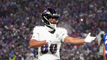Jan 19, 2025; Orchard Park, New York, USA; Baltimore Ravens tight end Isaiah Likely (80) celebrates after making a catch during the first quarter against the Buffalo Bills in a 2025 AFC divisional round game at Highmark Stadium. Mandatory Credit: Gregory Fisher-Imagn Images
