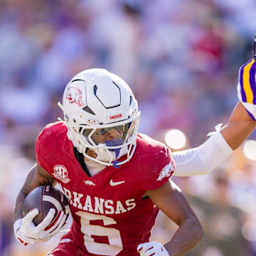 Arkansas Razorbacks wide receiver Raylen Sharpe (6) catches a pass against LSU Tigers cornerback DJ Pickett (3) during the second half at Tiger Stadium.