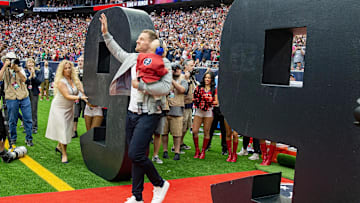 Oct 1, 2023; Houston, Texas, USA; Former Houston Texans JJ Watt waves to the fans during his Ring Of Honor Ceremony at halftime during the game between the Texans and Pittsburgh Steelers at NRG Stadium. Mandatory Credit: Thomas Shea-Imagn Images