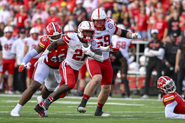 Nebraska Cornhuskers running back Emmett Johnson (21) rushes as Maryland Terrapins defensive lineman Dillan Fontus (46)