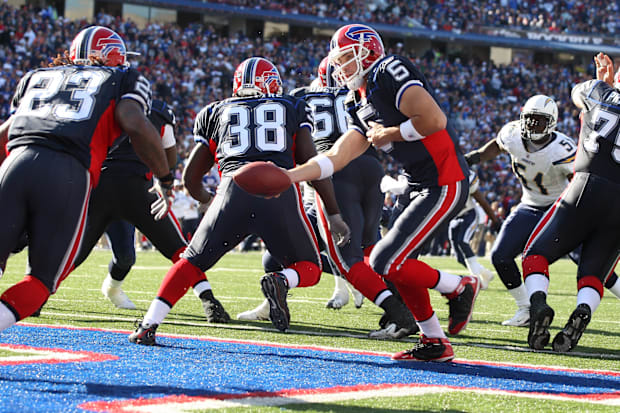 Buffalo Bills quarterback Trent Edwards hands off the ball to running back Marshawn Lynch against the San Diego Chargers.