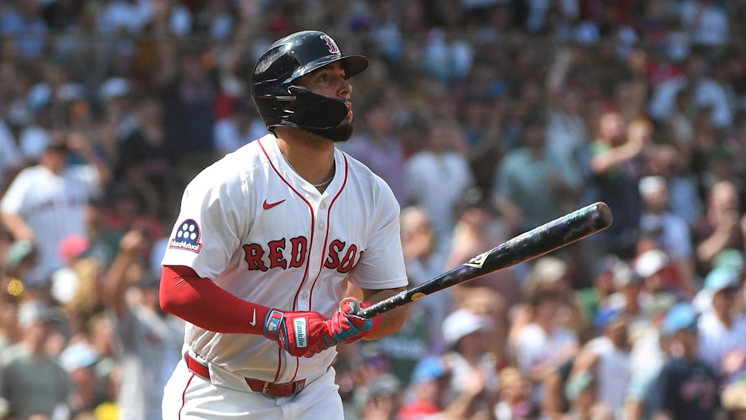 Aug 17, 2025; Boston, Massachusetts, USA;  Boston Red Sox right fielder Wilyer Abreu (52) hits a two run home run during the fourth inning against the Miami Marlins at Fenway Park. Mandatory Credit: Bob DeChiara-Imagn Images