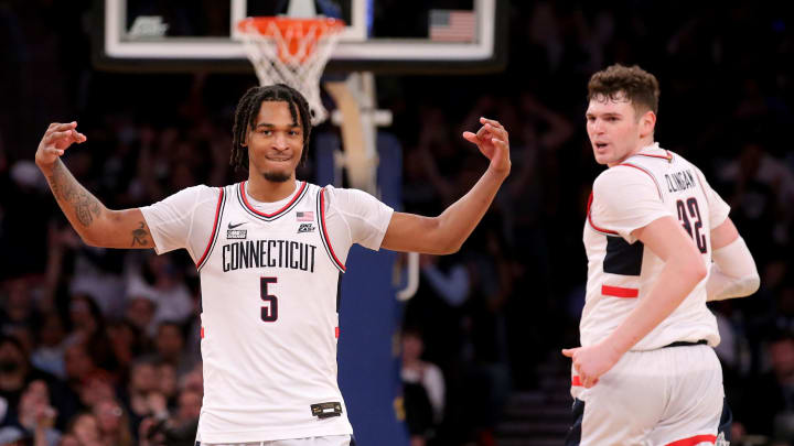 Mar 16, 2024; New York City, NY, USA; Connecticut Huskies guard Stephon Castle (5) and center Donovan Clingan (32) react during the second half against the Marquette Golden Eagles at Madison Square Garden. Mandatory Credit: Brad Penner-USA TODAY Sports