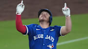Oct 27, 2025; Los Angeles, California, USA; Toronto Blue Jays catcher Alejandro Kirk (30) celebrates after hitting a three-run home run during the fourth inning against the Los Angeles Dodgers in game three of the 2025 MLB World Series at Dodger Stadium. 