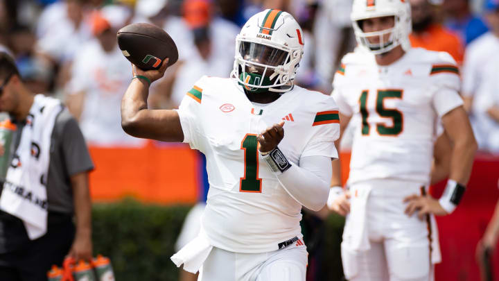 Aug 31, 2024; Gainesville, Florida, USA; Miami Hurricanes quarterback Cam Ward (1) throws the ball before a game against the Florida Gators at Ben Hill Griffin Stadium. Mandatory Credit: Matt Pendleton-USA TODAY Sports