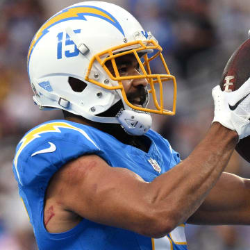 Nov 12, 2023; Inglewood, California, USA; Los Angeles Chargers wide receiver Jalen Guyton (15) celebrates after scoring a touchdown against the Detroit Lions during the second half at SoFi Stadium. Mandatory Credit: Orlando Ramirez-USA TODAY Sports