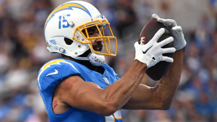 Nov 12, 2023; Inglewood, California, USA; Los Angeles Chargers wide receiver Jalen Guyton (15) celebrates after scoring a touchdown against the Detroit Lions during the second half at SoFi Stadium. Mandatory Credit: Orlando Ramirez-USA TODAY Sports