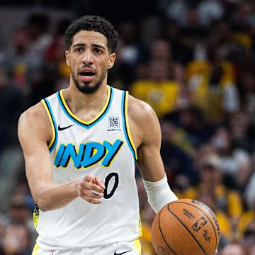 May 11, 2025; Indianapolis, Indiana, USA; Indiana Pacers guard Tyrese Haliburton (0) dribbles the ball during game four of the second round for the 2025 NBA Playoffs against the Cleveland Cavaliers at Gainbridge Fieldhouse. Mandatory Credit: Trevor Ruszkowski-Imagn Images