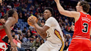 Nov 24, 2025; New Orleans, Louisiana, USA;  New Orleans Pelicans center Derik Queen (22) drives to the basket against Chicago Bulls guard Josh Giddey (3) during the first half at Smoothie King Center. Mandatory Credit: Stephen Lew-Imagn Images