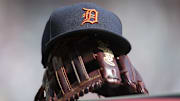 Jun 1, 2019; Atlanta, GA, USA; Detroit Tigers hat and glove are seen in the dugout before a game against the Atlanta Braves at SunTrust Park. 