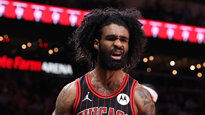 Chicago Bulls guard Coby White reacts to a play during an NBA game against the Atlanta Hawks.