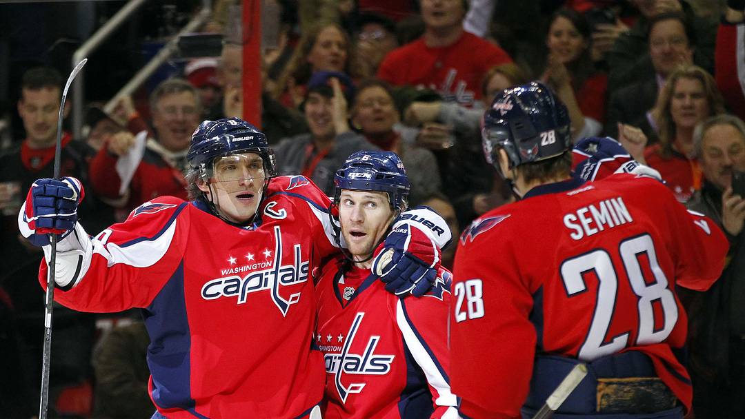 January 13, 2012; Washington, DC, USA; Washington Capitals left wing Alex Ovechkin (8) celebrates with Capitals defenseman Dennis Wideman (6) and Capitals left wing Alexander Semin (28) after scoring a goal against the Tampa Bay Lightning in the first period at Verizon Center. Mandatory Credit: Geoff Burke-Imagn Images