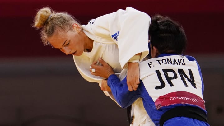 Jul 24, 2021; Tokyo, Japan; Daria Bilodid (UKR) competes against Funa Tonaki (JPN) in the women's 48kg judo semifinal during the Tokyo 2020 Olympic Summer Games at Nippon Budokan. 