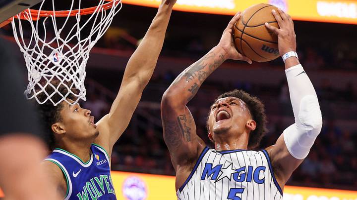 Paolo Banchero will miss at least a month and likely more after suffering a low-grade right high ankle sprain in Friday's game against the Minnesota Timberwolves.