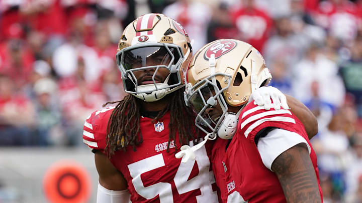 Nov 17, 2024; Santa Clara, California, USA; San Francisco 49ers linebacker Fred Warner (54) calms down San Francisco 49ers cornerback Deommodore Lenoir (2) after offsetting penalties against the Seattle Seahawks in the second quarter at Levi's Stadium. Mandatory Credit: David Gonzales-Imagn Images