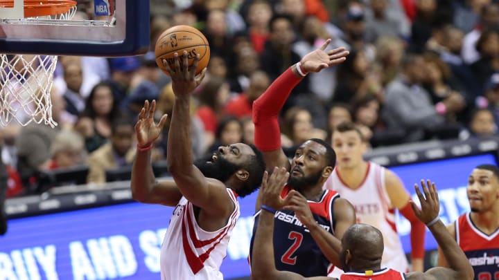 Nov 7, 2016; Washington, DC, USA; Houston Rockets guard James Harden (13) shoots the ball Washington Wizards guard John Wall (2) defends in the third quarter at Verizon Center. The Rockets won 114-106. Mandatory Credit: Geoff Burke-USA TODAY Sports