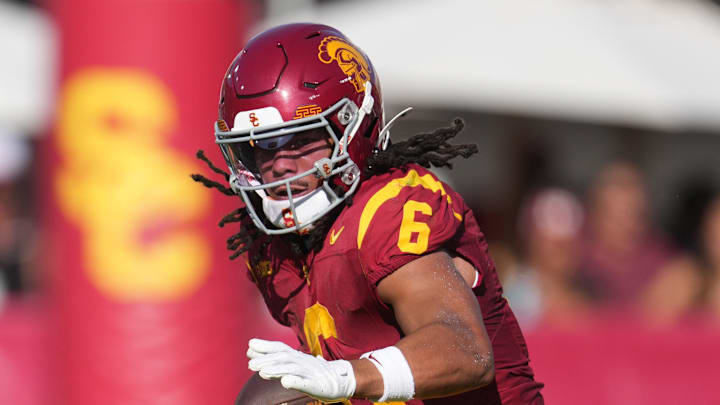 Aug 30, 2025; Los Angeles, California, USA; Southern California Trojans wide receiver Makai Lemon (6) carries the ball against the Missouri State Bears in the first half at United Airlines Field at Los Angeles Memorial Coliseum. Mandatory Credit: Kirby Lee-Imagn Images Aug 30, 2025; Los Angeles, California, USA; Southern California Trojans wide receiver Makai Lemon (6) carries the ball against the Missouri State Bears in the first half at United Airlines Field at Los Angeles Memorial Coliseum. Mandatory Credit: Kirby Lee-Imagn Images