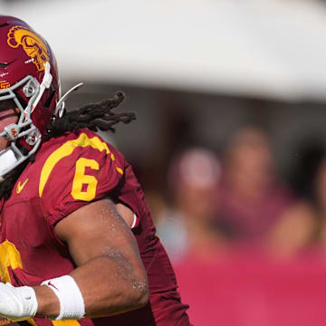 Aug 30, 2025; Los Angeles, California, USA; Southern California Trojans wide receiver Makai Lemon (6) carries the ball against the Missouri State Bears in the first half at United Airlines Field at Los Angeles Memorial Coliseum. Mandatory Credit: Kirby Lee-Imagn Images