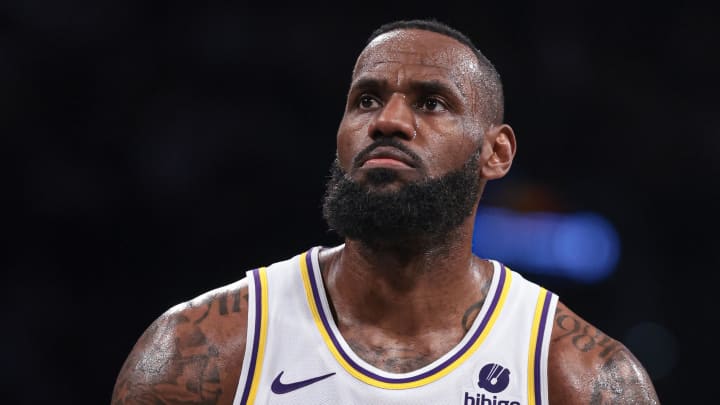 Mar 31, 2024; Brooklyn, New York, USA; Los Angeles Lakers forward LeBron James (23) attempts a free throw.