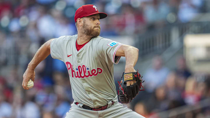 Aug 20, 2024; Cumberland, Georgia, USA; Philadelphia Phillies starting pitcher Zack Wheeler (45) pitches against the Atlanta Braves during the first inning at Truist Park.