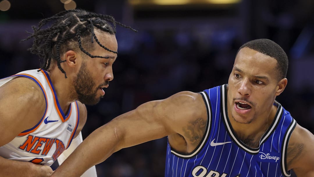 Orlando Magic guard Desmond Bane is guarded by New York Knicks guard Jalen Brunson.