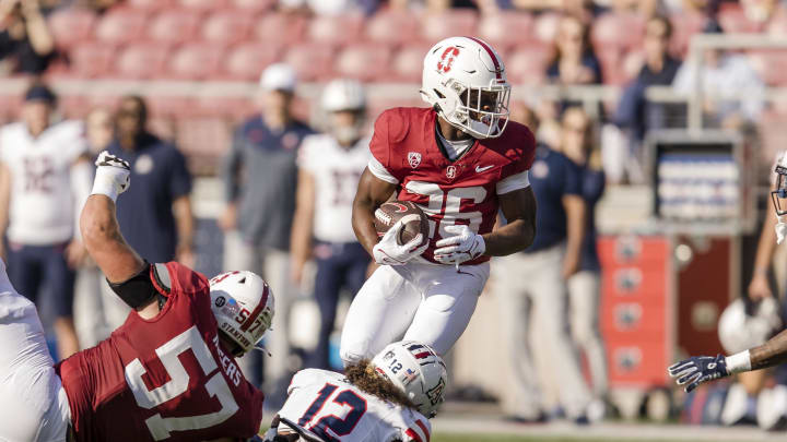 Sep 23, 2023; Stanford, California, USA; Stanford Cardinal running back Sedrick Irvin (26) runs the ball against the Arizona Wildcats during the first quarter at Stanford Stadium. Mandatory Credit: John Hefti-USA TODAY Sports