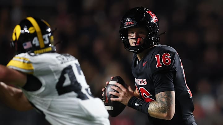 Sep 19, 2025; Piscataway, New Jersey, USA; Rutgers Scarlet Knights quarterback Athan Kaliakmanis (16) looks to pass during the first half against the Iowa Hawkeyes at SHI Stadium. Mandatory Credit: Vincent Carchietta-Imagn Images Sep 19, 2025; Piscataway, New Jersey, USA; Rutgers Scarlet Knights quarterback Athan Kaliakmanis (16) looks to pass during the first half against the Iowa Hawkeyes at SHI Stadium. Mandatory Credit: Vincent Carchietta-Imagn Images