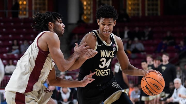 Jan 14, 2023; Chestnut Hill, Massachusetts, USA; Wake Forest Demon Deacons forward Bobi Klintman (34) drives the ball  during the first half against the Boston College Eagles at Conte Forum. Mandatory Credit: Eric Canha-USA TODAY Sports