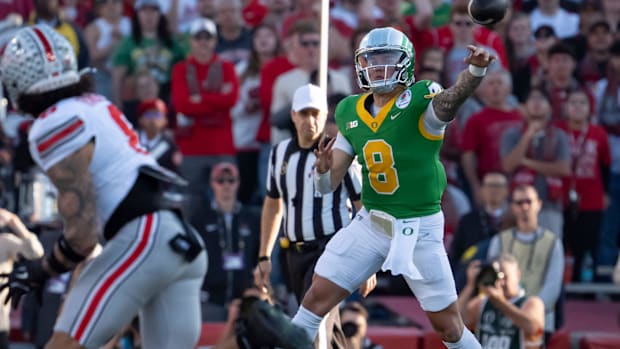 Oregon quarterback Dillon Gabriel throws out a pass as the Oregon Ducks face the Ohio State Buckeyes Wednesday, Jan. 1, 2025,
