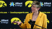 Jan Jensen speaks to media personnel after being named the new Iowa women’s basketball head coach