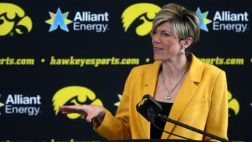 Jan Jensen speaks to media personnel after being named the new Iowa women’s basketball head coach