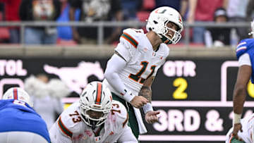 Nov 1, 2025; Dallas, Texas, USA;  Miami Hurricanes quarterback Carson Beck (11) reacts to a false start penalty by the offense during the second quarter against the SMU Mustangs at Gerald J. Ford Stadium. Mandatory Credit: Jerome Miron-Imagn Images