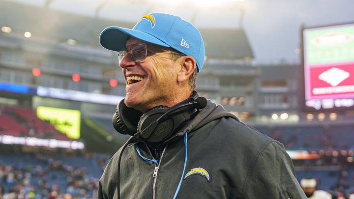 Dec 28, 2024; Foxborough, Massachusetts, USA; Los Angeles Chargers head coach Jim Harbaugh reacts after defeating the New England Patriots at Gillette Stadium. Mandatory Credit: David Butler II-Imagn Images
