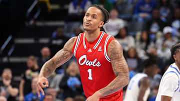 Feb 23, 2025; Memphis, Tennessee, USA; Florida Atlantic Owls forward Kaleb Glenn (1) reacts after a three point basket against the Memphis Tigers during the first half at FedExForum. Mandatory Credit: Wesley Hale-Imagn Images