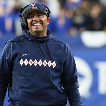 Nov 9, 2024; Pittsburgh, Pennsylvania, USA;  Virginia Cavaliers head coach Tony Elliott reacts on the sidelines against the Pittsburgh Panthers during the second quarter at Acrisure Stadium. Mandatory Credit: Charles LeClaire-Imagn Images