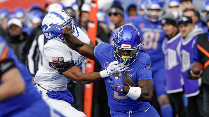 Nov 24, 2023; Boise, Idaho, USA; Boise State Broncos running back Ashton Jeanty (2) carries the ball during the first half against the Air Force Falcons at Albertsons Stadium. Mandatory Credit: Brian Losness-USA TODAY Sports

