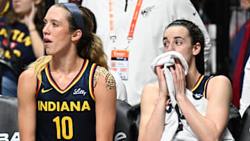 Sep 22, 2024; Uncasville, Connecticut, USA; Indiana Fever guard Lexie Hull (10) and Indiana Fever guard Caitlin Clark (22) watch from the bench in the fourth quarter during game one of the first round of the 2024 WNBA Playoffs at Mohegan Sun Arena. Mandatory Credit: Mark Smith-Imagn Images
