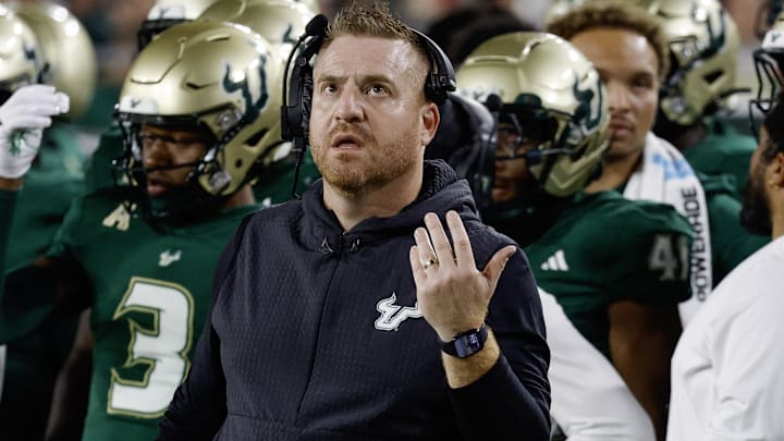 Oct 18, 2025; Tampa, Florida, USA;  South Florida Bulls head coach Alex Golesh reacts to a replay during the second quarter against the Florida Atlantic Owls at Raymond James Stadium. Mandatory Credit: Reinhold Matay-Imagn Images