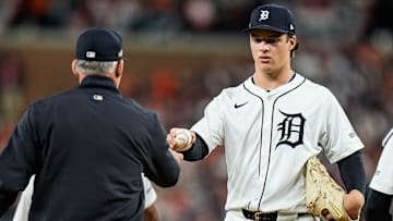 Detroit Tigers pitcher Jackson Jobe (21) hands the ball to manager A.J. Hinch (14) for pitching change against Cleveland Guardians during the ninth inning at Game 4 of ALDS at Comerica Park in Detroit on Thursday, Oct. 10, 2024.
