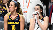 Sep 22, 2024; Uncasville, Connecticut, USA; Indiana Fever guard Lexie Hull (10) and Indiana Fever guard Caitlin Clark (22) watch from the bench in the fourth quarter during game one of the first round of the 2024 WNBA Playoffs at Mohegan Sun Arena. Mandatory Credit: Mark Smith-Imagn Images