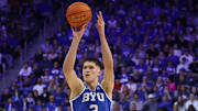 Mar 8, 2025; Provo, Utah, USA; Brigham Young Cougars guard Egor Demin (3) takes a three point shot against the Utah Utes during the first half at Marriott Center. Mandatory Credit: Rob Gray-Imagn Images