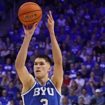 Mar 8, 2025; Provo, Utah, USA; Brigham Young Cougars guard Egor Demin (3) takes a three point shot against the Utah Utes during the first half at Marriott Center. Mandatory Credit: Rob Gray-Imagn Images
