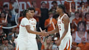 Texas Longhorns guard Simeon Wilcher is congratulated by guard Tramon Mark during the second half against the Lafayette Leopards at Moody Center. 