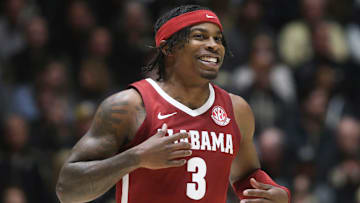 Alabama Crimson Tide guard Latrell Wrightsell Jr. (3) smiles while jogging onto the court Friday, Nov. 15, 2024, during the NCAA men’s basketball game against the Purdue Boilermakers at Mackey Arena in West Lafayette, Ind. Purdue Boilermakers won 87-78.