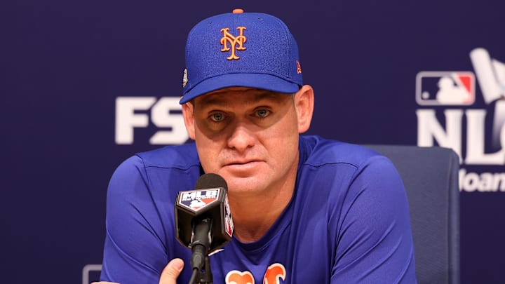 Oct 13, 2024; Los Angeles, California, USA; New York Mets manager Carlos Mendoza (64) speaks to the media before game one of the NLCS for the 2024 MLB Playoffs at Dodger Stadium. Mandatory Credit: Kiyoshi Mio-Imagn Images Oct 13, 2024; Los Angeles, California, USA; New York Mets manager Carlos Mendoza (64) speaks to the media before game one of the NLCS for the 2024 MLB Playoffs at Dodger Stadium. Mandatory Credit: Kiyoshi Mio-Imagn Images