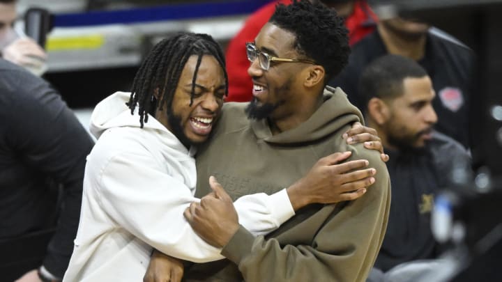 Feb 8, 2023; Cleveland, Ohio, USA; Cleveland Cavaliers guard Darius Garland (left) and Cleveland Cavaliers guard Donovan Mitchell (45) celebrate late in the fourth quarter against the Detroit Pistons at Rocket Mortgage FieldHouse. Mandatory Credit: David Richard-USA TODAY Sports