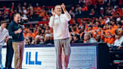 Illinois men's basketball coach Brad Underwood applauds during the Illini's 113-55 season-opening win over Jackson State on Monday at the State Farm Center in Champaign, Illinois.