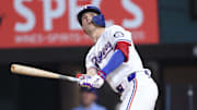 Texas Rangers center fielder Michael Helman (24) hits a grand slam home run against the Milwaukee Brewers during the fifth inning at Globe Life Field. 