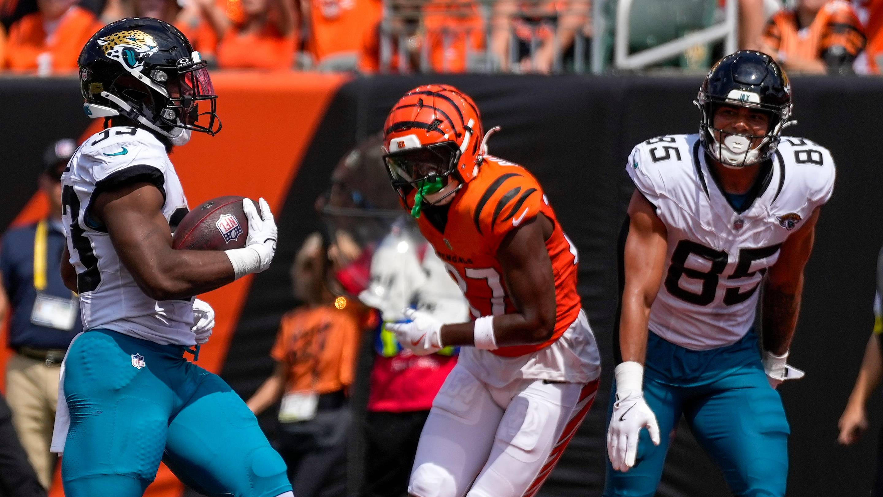 Jacksonville Jaguars running back Bhayshul Tuten (33) runs in a touchdown in the second quarter of the NFL Week 2 game between the Cincinnati Bengals and the Jacksonville Jaguars at Paycor Stadium in downtown Cincinnati on Sunday, Sept. 14, 2025. The Jaguars led 17-10 at halftime.